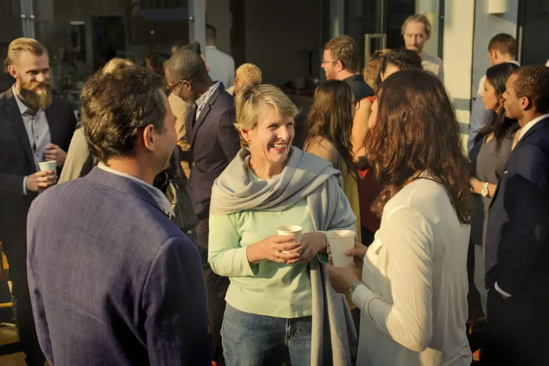 business-colleagues-networking-at-an-outdoor-event-2026-03-18-11-10-22-utc-scaled