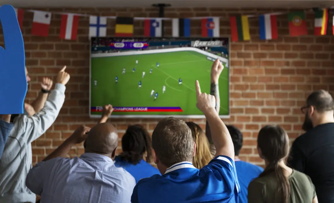 frieds-cheering-sport-at-bar-together-2026-03-19-04-04-15-utc-scaled