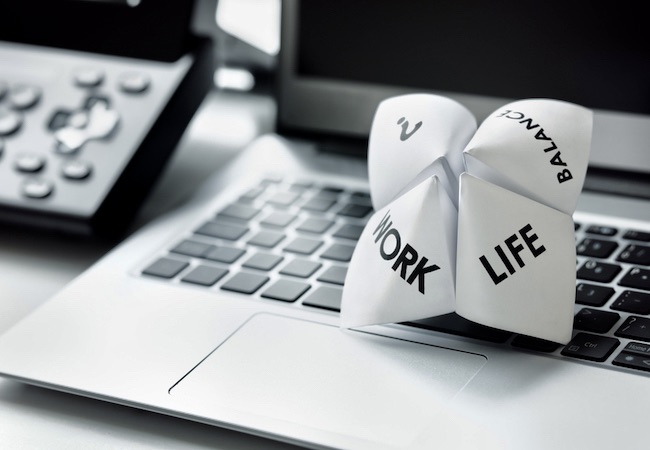 Origami,fortune,teller,on,laptop,in,office,concept,for,work