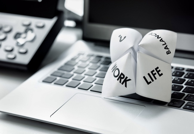 Origami,fortune,teller,on,laptop,in,office,concept,for,work