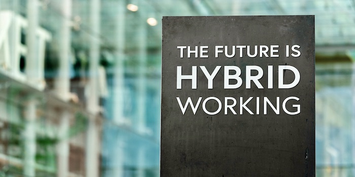 The,future,of,work,is,hybrid,sign,in,front,of